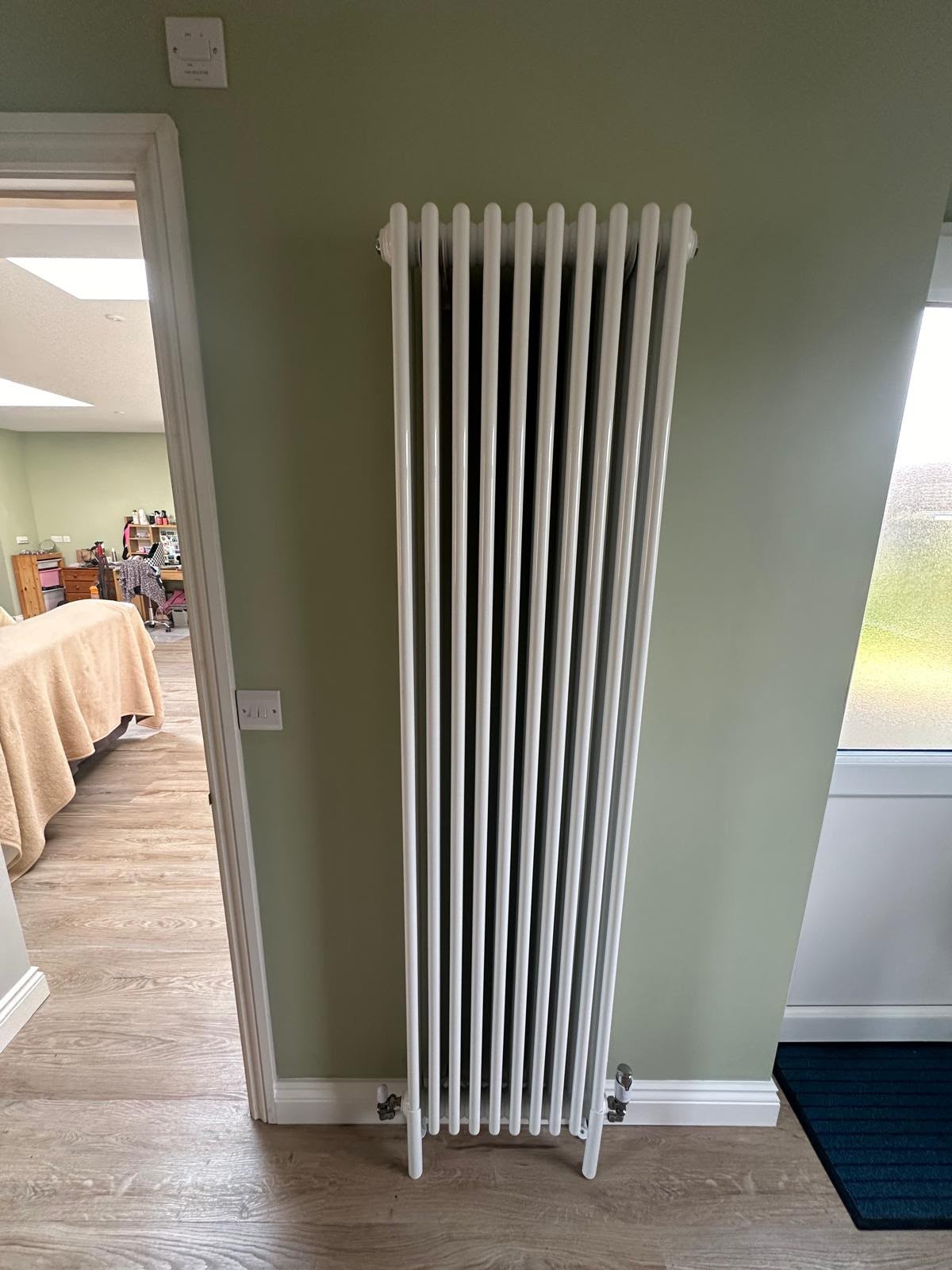 New radiator and valves installed as part of a central heating upgrade in Hampshire