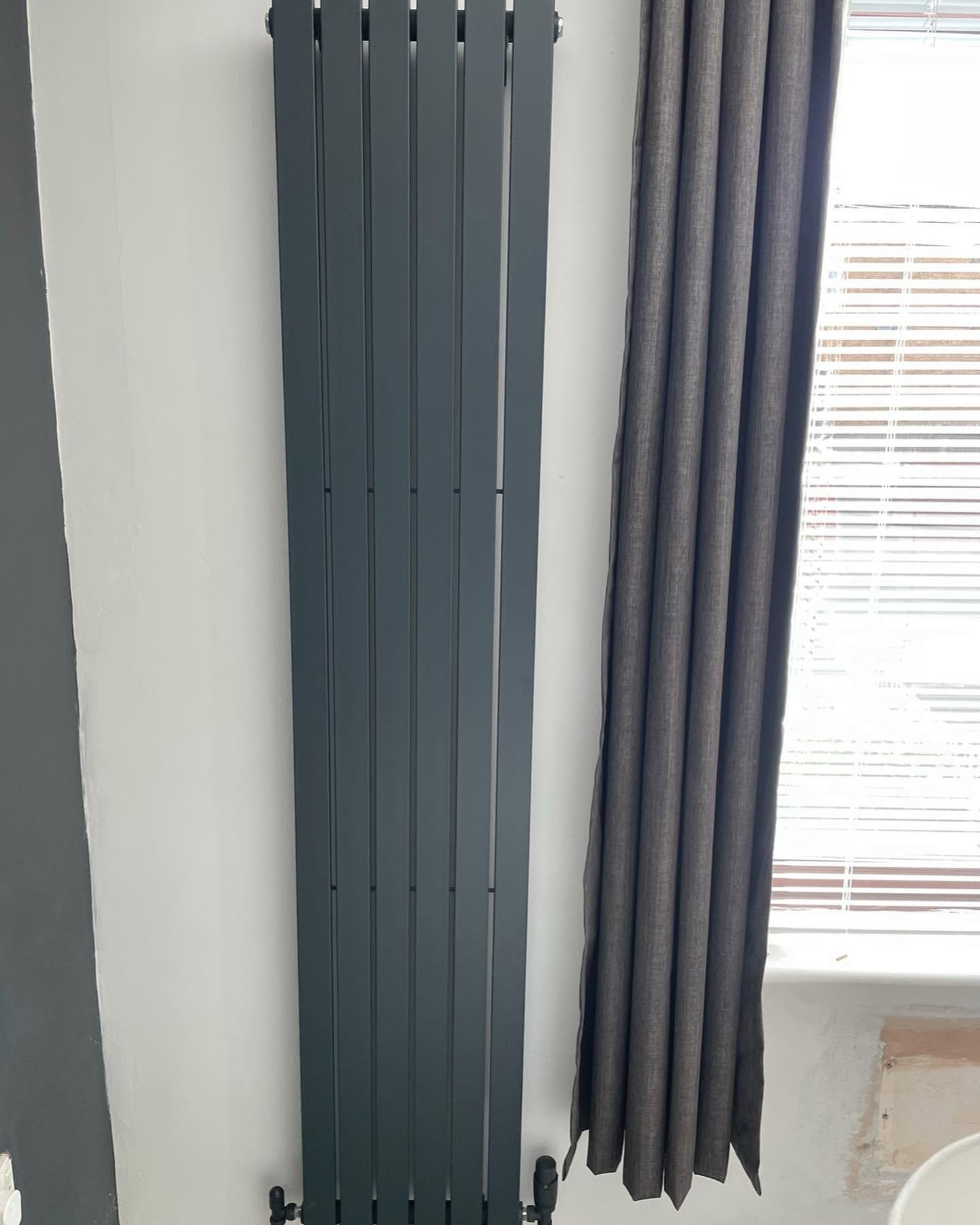 New radiator installed as part of a central heating installation in north Hampshire