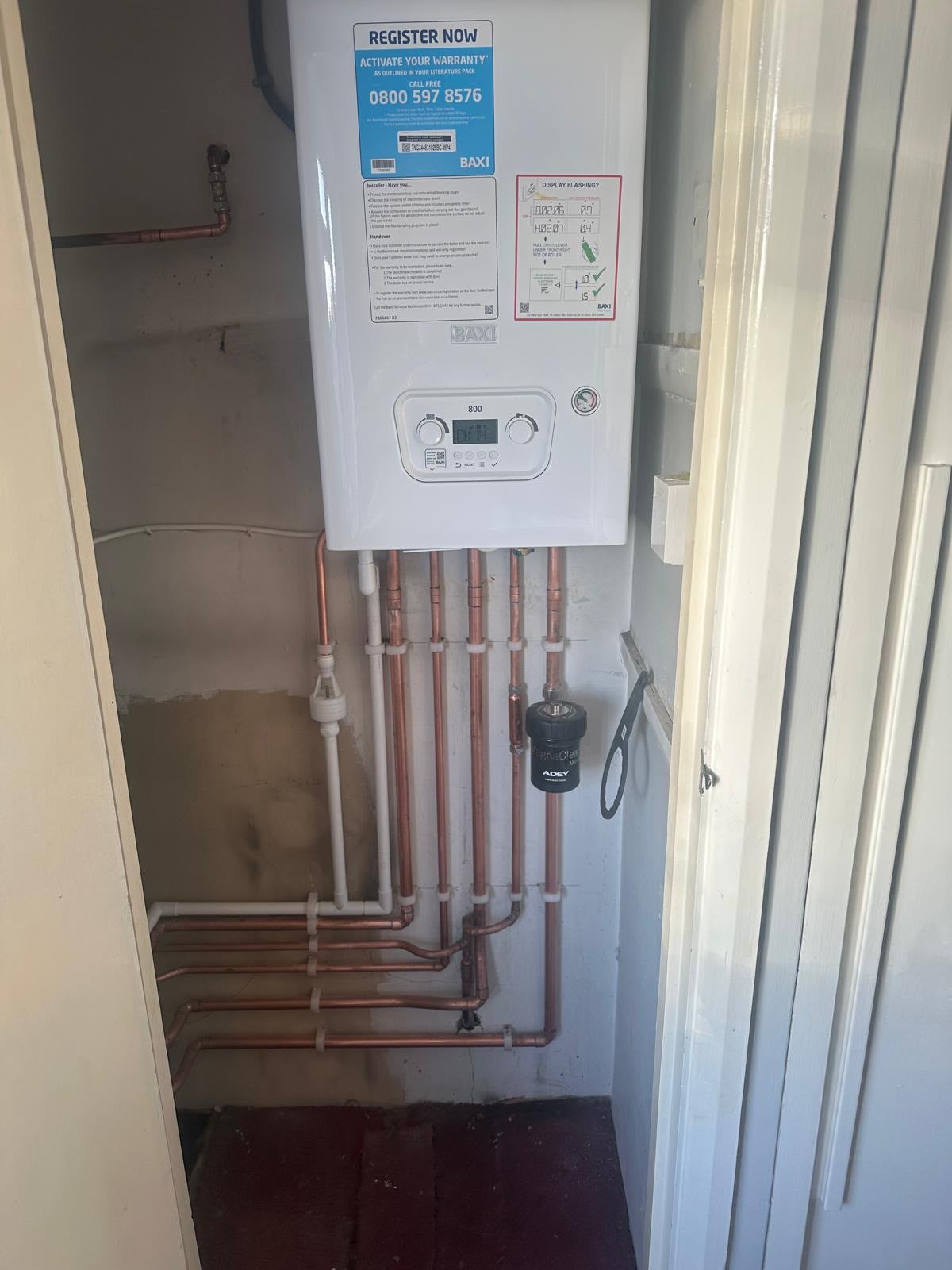 Combi boiler replacement completed in a utility room in Basingstoke