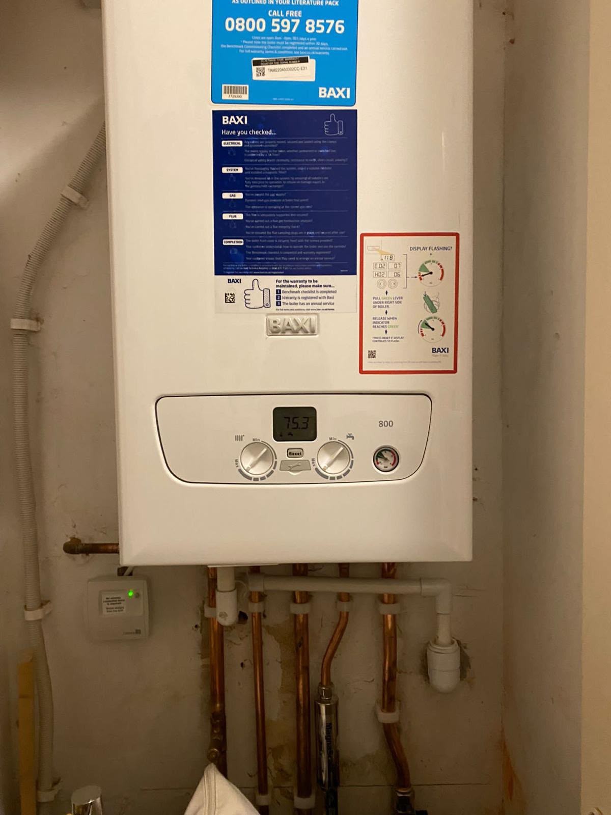 Boiler installation with system filter and pipework brought up to current standards