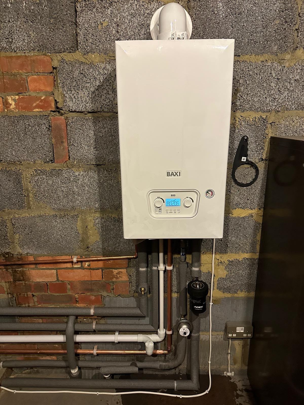 New boiler installation in a north Hampshire home with clearly labelled isolation valves