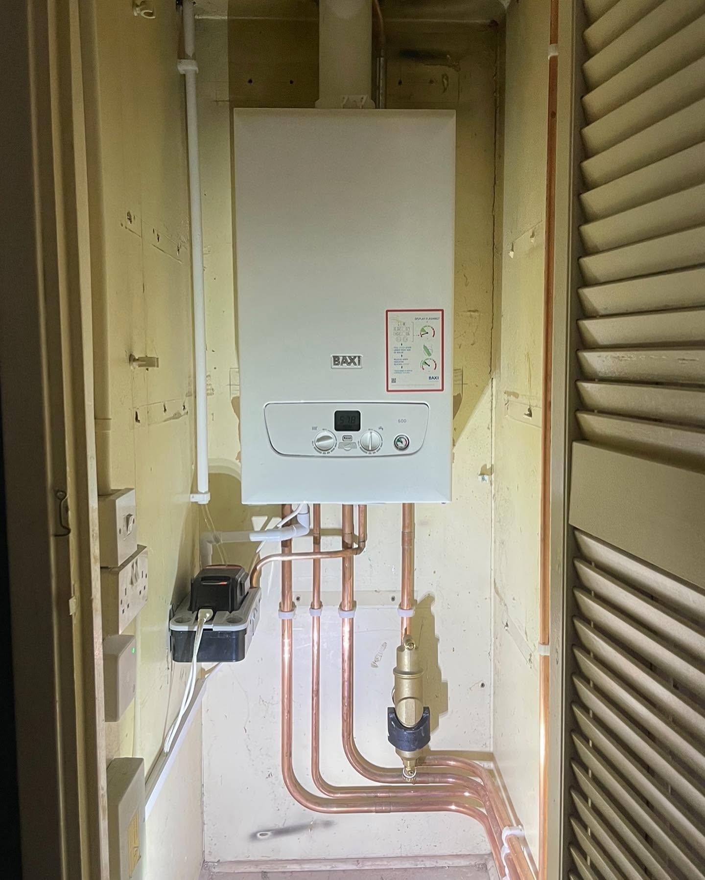 Baxi boiler installed in an airing cupboard after a boiler replacement